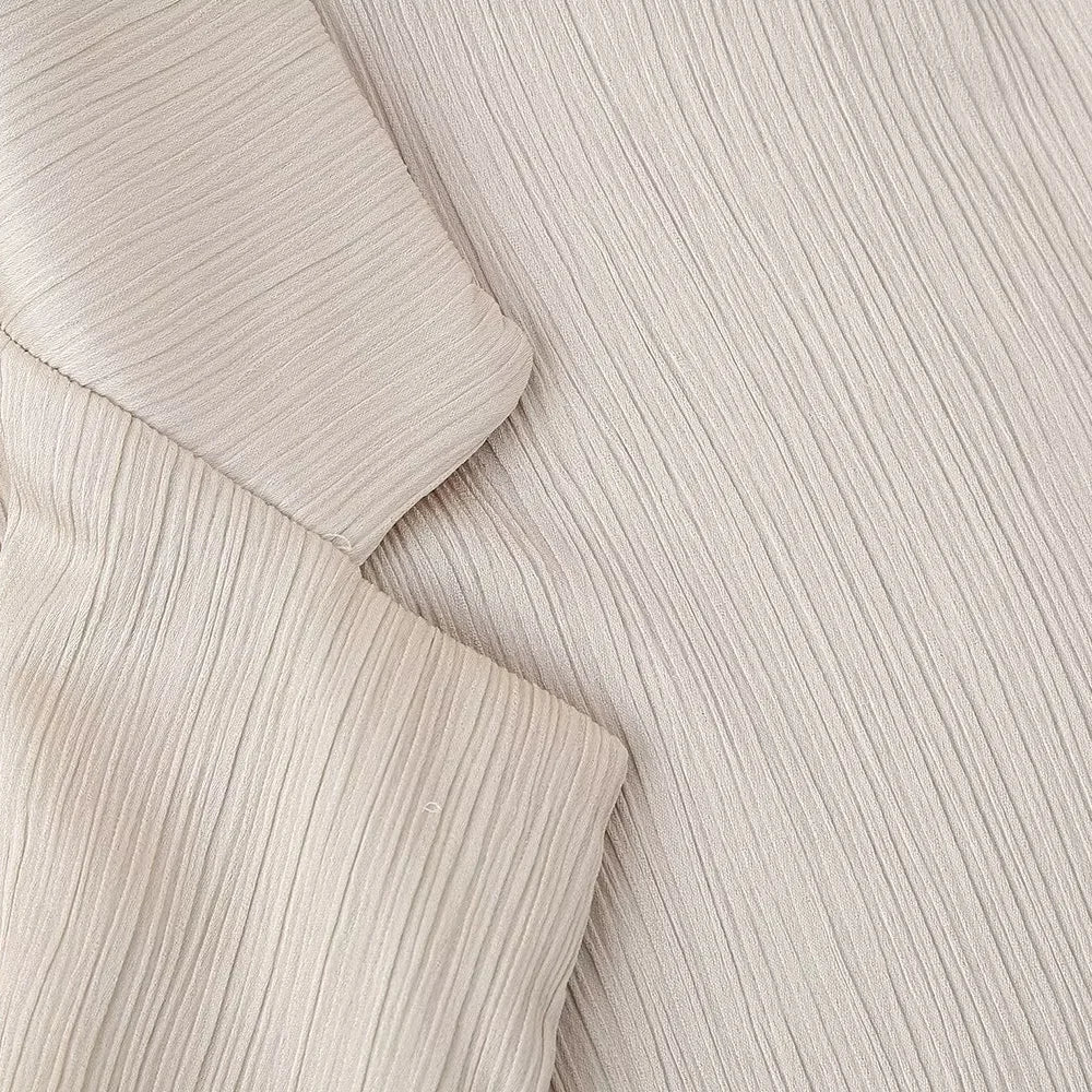 Traje elegante y arrugado™